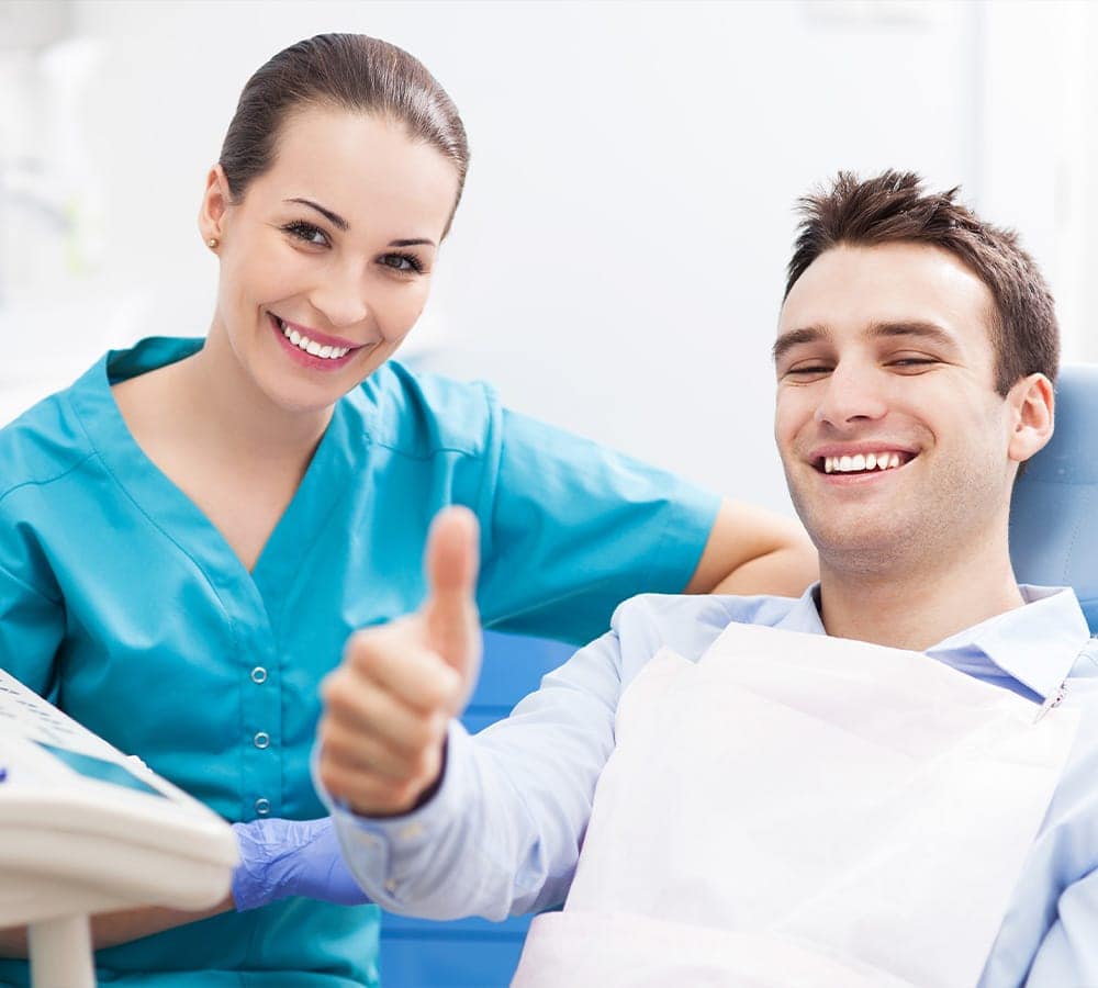male patient on dental chair at red and ritchey orthodontics